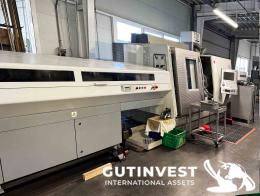 1  -  CNC Lathe with Bar Feeder