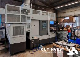 1  -  4-Axis CNC Lathe with Robotic Arm