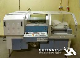 2  -  Shrink Wrapping Machine