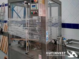 2  -  Precintadora automática de botellas de vidrio