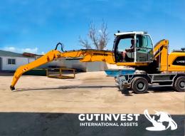1  -  Recycling material handling machine with grab