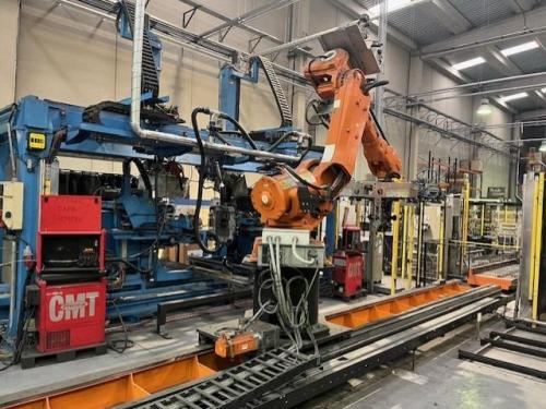 Handling robot with track
