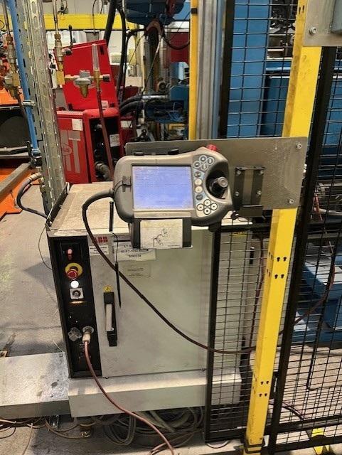 Handling robot with track