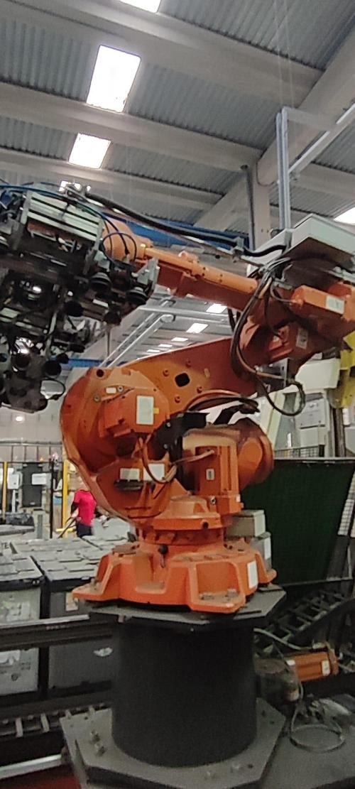 Handling robot with track