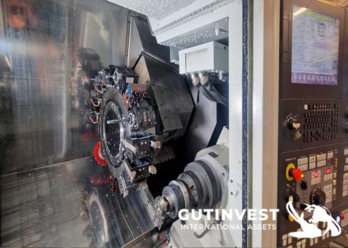 4-Axis CNC Lathe with Robotic Arm