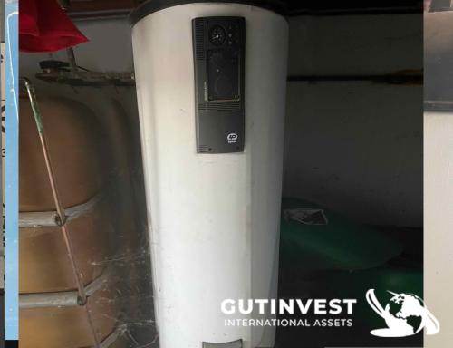 Diesel boiler with burner and water storage tank