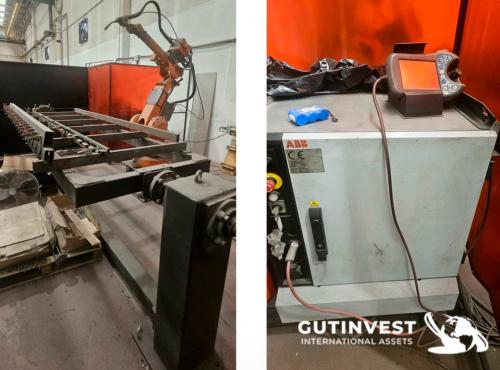 Robot de soldadura con mesa volteadora