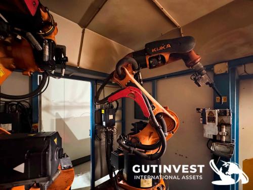 Two-robot arc welding cell unit