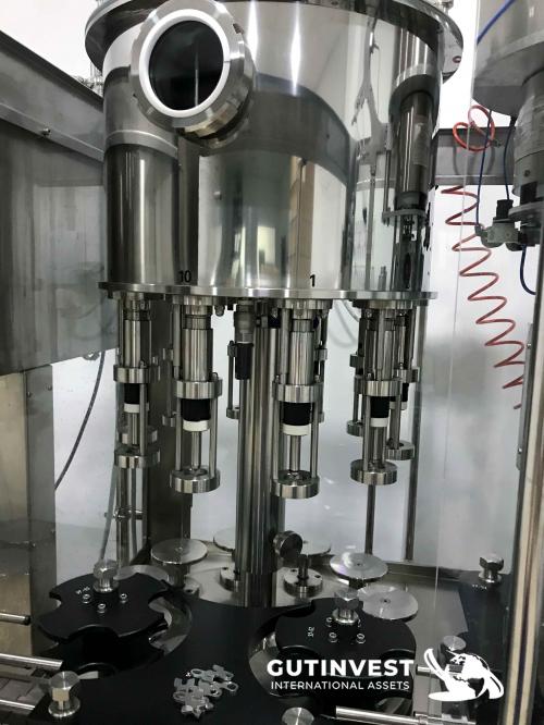 Filling and capping machine Monoblock  -1.100 bot/h