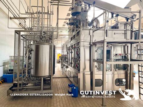 Aseptic line for blowing and packaging PET bottles