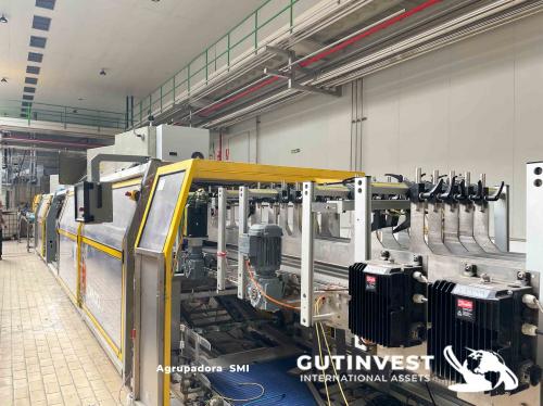Aseptic line for blowing and packaging PET bottles