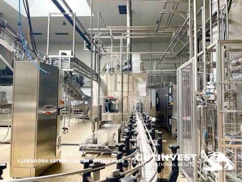 Aseptic line for blowing and packaging PET bottles