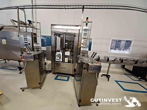 Labelling sleeving machine