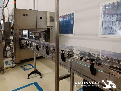 Labelling sleeving machine