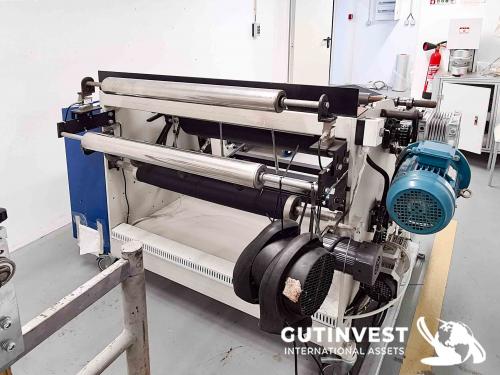 Rewinder with automatic cutting