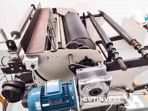Rewinder with automatic cutting