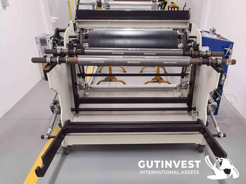 Rewinder with automatic cutting