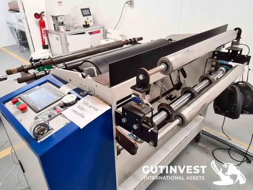 Rewinder with automatic cutting
