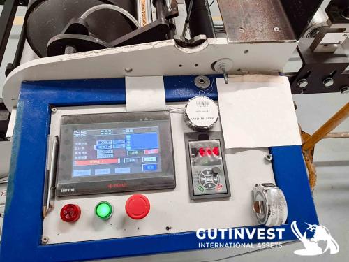 Rewinder with automatic cutting