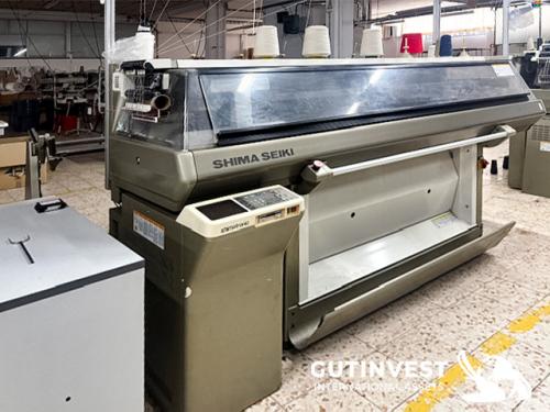 Textile flat knitting machine