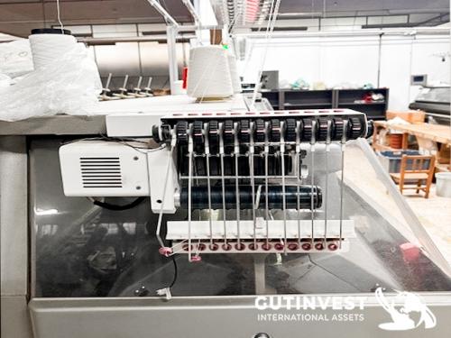 Textile flat knitting machine