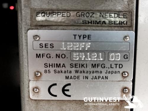 Textile flat knitting machine