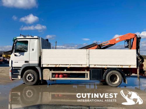 Truck with open box and crane