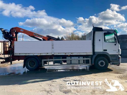 Truck with open box and crane