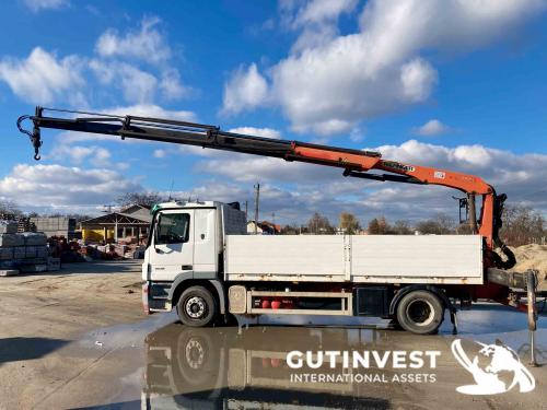 Truck with open box and crane