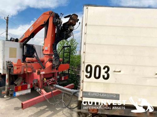 Truck with open box and crane