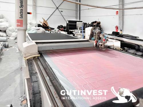 Automatic textile cutting machine