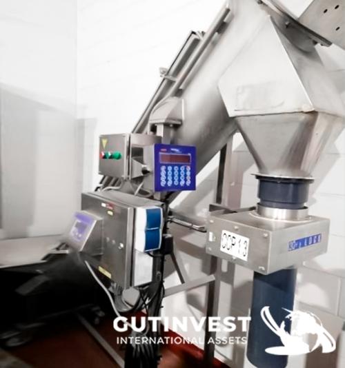 Auger with integrated scale and metal detector