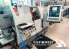 2  -  Torno CNC de cabezal móvil con alimentador de barras