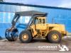 1  -  Wheel loader with arm and wood clip