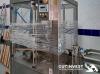 2  -  Precintadora automática de botellas de vidrio