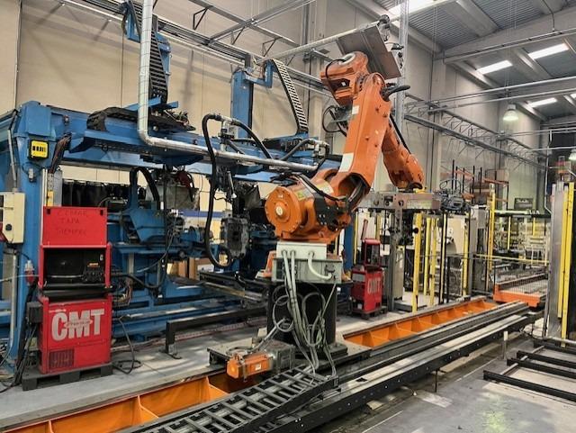 Handling robot with track