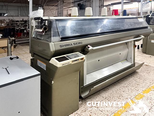 Textile flat knitting machine