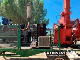 Mobile wood chipper with engine and trailer